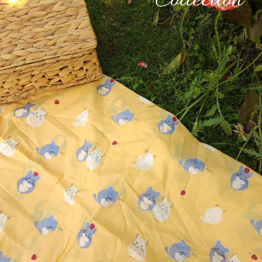 Yellow background with grey mouse and apple printed figures jaipuri cotton