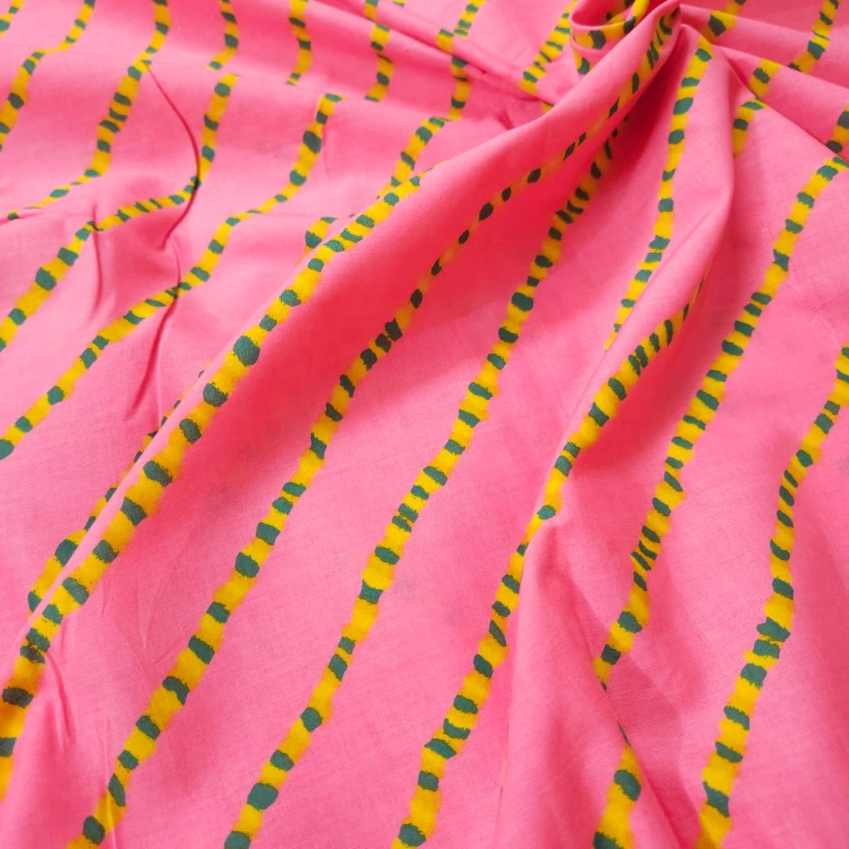 Pink shade base lehariya print on overall fabric, cotton fabric.
