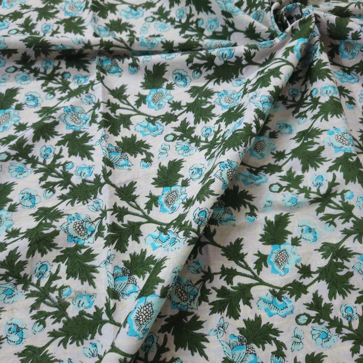 Pastel shade base traditional leaves and flower jaal print on overall fabric, cotton fabric.